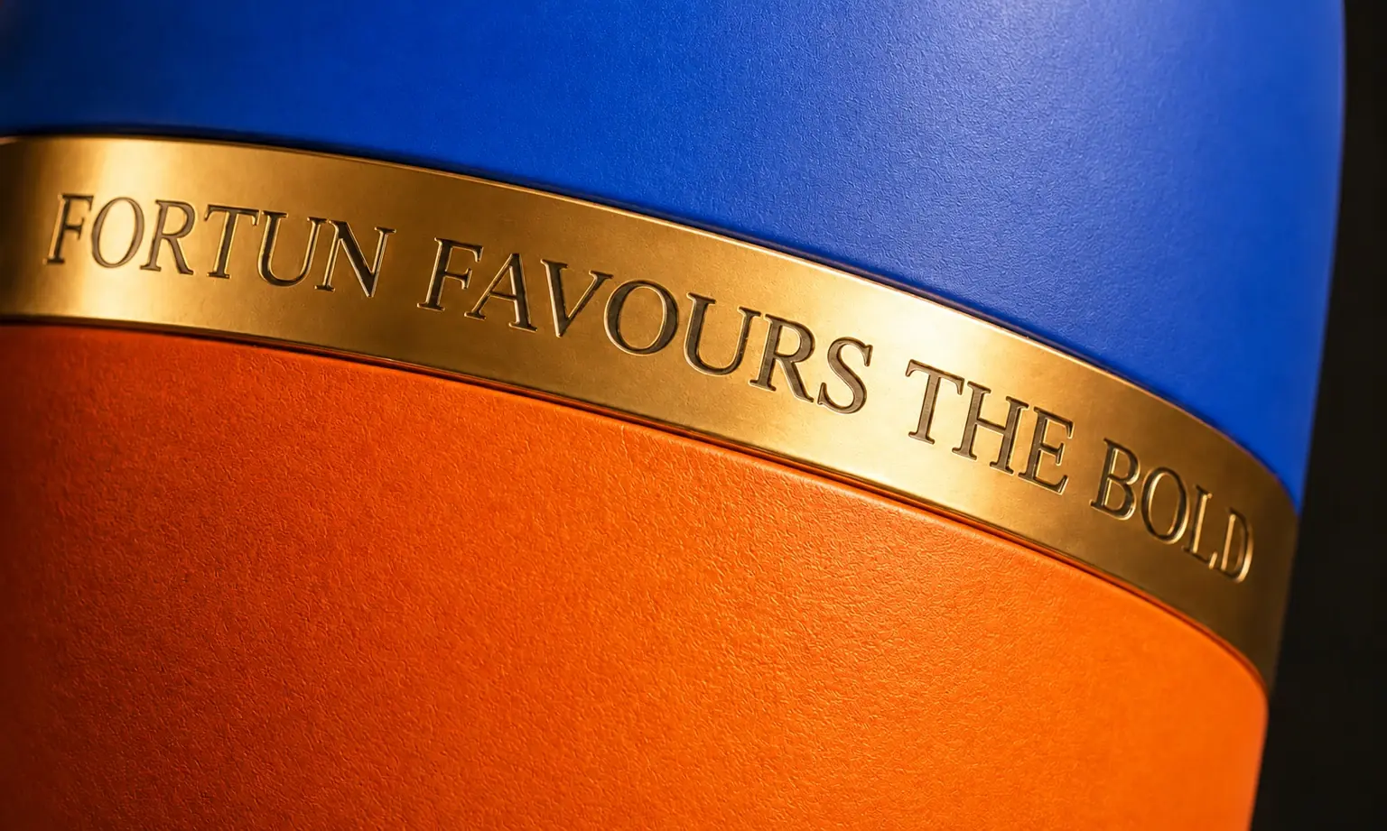 Engraved gold ring reading Fortun favours the bold